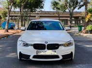 Cần bán xe BMW 3 Series sản xuất 2014, màu trắng, nhập khẩu nguyên chiếc giá cạnh tranh giá 920 triệu tại Tp.HCM