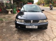 Mitsubishi Lancer GLXI 1.6 MT 2003 - Cần bán Mitsubishi Lancer GLXI 1.6 MT sản xuất 2003, màu xanh lam xe gia đình giá 125 triệu tại Bắc Giang