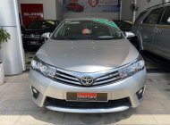 Toyota Corolla altis G 2016 - Cần bán lại xe Toyota Corolla Altis G sản xuất 2016, màu bạc giá 650 triệu tại Tp.HCM