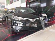 Toyota Corolla altis 1.8E MT 2019 - Bán xe Toyota Corolla altis 1.8E MT đời 2019, màu đen giá 637 triệu tại Tp.HCM