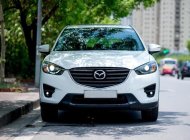 Mazda CX 5 2.5 2016 - Nhà mình cần ra đi con Mazda CX5 2.5 đời 2016, số tự động, một cầu, bản full, màu trắng giá 687 triệu tại Tp.HCM