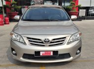 Toyota Corolla altis 2013 - Cần bán xe Toyota Corolla Altis 1.8G năm 2013, màu vàng cát, biển SG - đúng chất 54.000km giá 530 triệu tại Tp.HCM