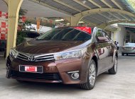 Cần bán gấp Toyota Corolla altis 1.8 năm 2017, màu nâu, giá tốt giá 650 triệu tại Tp.HCM