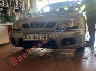 Daewoo Lanos   SX 2003 - Bán Daewoo Lanos SX sản xuất 2003, màu ghi vàng giá 60 triệu tại Hà Tĩnh