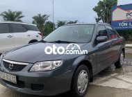 Mazda 323    2001 - Cần bán xe Mazda 323 đời 2001, màu xám, xe nhập còn mới giá 115 triệu tại TT - Huế