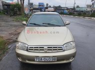 Kia Spectra   1.6 MT  2004 - Xe Kia Spectra 1.6 MT sản xuất năm 2004, màu vàng còn mới, 90 triệu giá 90 triệu tại Tiền Giang