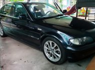 BMW 325i 2004 - Cần bán lại xe BMW 325i đời 2004, màu đen xe gia đình, giá tốt giá 200 triệu tại Đà Nẵng