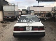 Toyota Corolla 1986 - Cần bán gấp Toyota Corolla 1986, màu trắng giá 45 triệu tại Long An