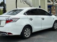 Toyota Vios   J   2014 - Cần bán Toyota Vios J đời 2014, màu trắng còn mới, giá tốt giá 260 triệu tại Bình Dương