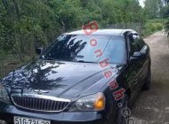 Daewoo Magnus   2.5 AT  2004 - Cần bán gấp Daewoo Magnus 2.5 AT 2004, màu đen còn mới   giá 114 triệu tại Bình Phước