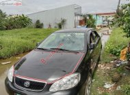 Toyota Corolla    2003 - Cần bán xe Toyota Corolla đời 2003, màu đen còn mới giá 129 triệu tại Sóc Trăng