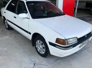 Mazda 323 1995 - Bán ô tô Mazda 323 sản xuất năm 1995, màu trắng, giá chỉ 45 triệu giá 45 triệu tại Bình Định