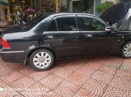 Ford Laser   GHIA 1.8 AT  2005 - Bán ô tô Ford Laser GHIA 1.8 AT sản xuất 2005, màu đen giá cạnh tranh giá 185 triệu tại Hà Tĩnh