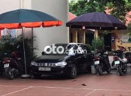 Kia Spectra 2004 - Bán Kia Spectra năm 2004, màu đen giá 90 triệu tại Nam Định