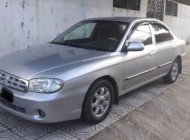 Kia Spectra   1.6 MT 2004 - Cần bán Kia Spectra 1.6 MT đời 2004, màu bạc chính chủ giá 85 triệu tại Bình Định