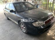 Kia Spectra 2003 - Bán xe Kia Spectra sản xuất 2003, màu đen giá 65 triệu tại Hà Tĩnh