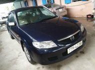 Mazda 323     2002 - Cần bán Mazda 323 năm sản xuất 2002, màu xanh lam, giá 132tr giá 132 triệu tại Bình Định