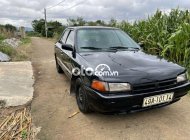 Mazda 323 1995 - Cần bán lại xe Mazda 323 năm sản xuất 1995, màu đen, nhập khẩu giá 36 triệu tại Đắk Lắk