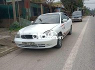 Daewoo Nubira 2003 - Cần bán gấp Daewoo Nubira sản xuất 2003, màu trắng xe gia đình giá cạnh tranh giá 62 triệu tại Quảng Nam