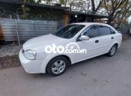 Daewoo Lacetti  SE  2004 - Bán xe Daewoo Lacetti SE năm sản xuất 2004, màu trắng giá 118 triệu tại Tp.HCM