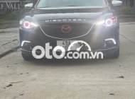 Cần bán lại xe Mazda 6 2.5 Premium năm sản xuất 2014, màu đen, giá tốt giá 568 triệu tại Lâm Đồng