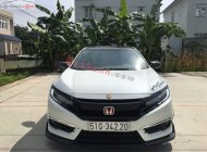 Honda Civic L 1.5 Turbo 2016 - Bán ô tô Honda Civic L 1.5 Turbo sản xuất năm 2016, màu trắng, nhập khẩu xe gia đình giá 692 triệu tại Đồng Tháp