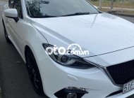 Mazda 3 AT 2015 - Cần bán gấp Mazda 3 AT năm 2015, màu trắng ít sử dụng giá 455 triệu tại Đồng Nai