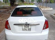 Daewoo Lacetti MT 2004 - Bán Daewoo Lacetti MT 2004, màu trắng, xe nhập giá 112 triệu tại Tp.HCM