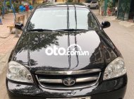 Daewoo Lacetti EX 2010 - Bán Daewoo Lacetti EX sản xuất 2010, màu đen số sàn giá 148 triệu tại Hà Nội