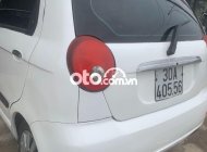 Chevrolet Spark MT 2009 - Cần bán xe Chevrolet Spark MT 2009, màu trắng còn mới giá 78 triệu tại Hà Nội