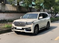 Toyota Land Cruiser 5.7 V8 2012 - Cần bán xe Toyota Land Cruiser 5.7 V8 trắng nội thất kem, năm 2012 full option giá 2 tỷ 750 tr tại Hà Nội