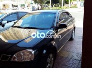 Daewoo Lacetti MT 2005 - Cần bán gấp Daewoo Lacetti MT đời 2005, màu đen, giá chỉ 125 triệu giá 125 triệu tại BR-Vũng Tàu