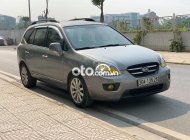 Kia Carens MT 2010 - Cần bán gấp Kia Carens MT sản xuất 2010, màu xám còn mới giá 225 triệu tại Hà Nội