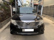 Toyota Fortuner V 2014 - Xe của nhà bán Toyota Fortuner 2014, số tự động, máy xăng, dòng V, màu đen giá 498 triệu tại Tp.HCM