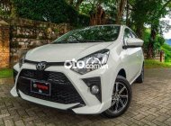 Cần bán xe Toyota Wigo 1.2 AT 2021, màu trắng, xe nhập, giá 385tr giá 385 triệu tại Tp.HCM