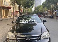 Daewoo Lacetti   EX 2010 - Cần bán Daewoo Lacetti EX sản xuất năm 2010, màu đen số sàn, giá 150tr giá 150 triệu tại Hà Nội