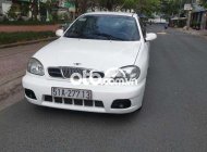 Daewoo Lanos MT 2003 - Cần bán gấp Daewoo Lanos MT năm 2003, màu trắng, nhập khẩu nguyên chiếc, giá chỉ 80 triệu giá 69 triệu tại Tp.HCM