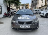 Kia Forte  MT 2010 - Cần bán gấp Kia Forte MT đời 2010, màu xám, nhập khẩu nguyên chiếc chính chủ giá 245 triệu tại Hà Nội