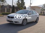 Kia Forte MT 2010 - Cần bán lại xe Kia Forte MT năm 2010, màu trắng, 260 triệu giá 260 triệu tại Hà Nội