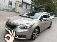 Kia K3   AT 2014 - Bán xe Kia K3 AT năm 2014, màu vàng cát, nhập khẩu giá 390 triệu tại Hà Nội