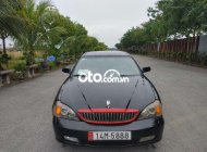 Daewoo Magnus AT 2004 - Cần bán xe Daewoo Magnus AT sản xuất năm 2004, màu đen số tự động, giá chỉ 125 triệu giá 125 triệu tại Hải Phòng