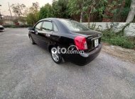 Daewoo Lacetti EX 2010 - Cần bán Daewoo Lacetti EX năm sản xuất 2010, màu đen giá 155 triệu tại Quảng Ninh