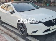 Mazda 6 2018 - Cần bán xe Mazda 6 sản xuất 2018, màu trắng giá 690 triệu tại Quảng Ninh
