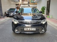 Cần bán Toyota Camry 2.0E sản xuất 2015, màu đen giá 705 triệu tại Hải Phòng