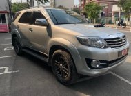 Toyota Fortuner G 2015 - Cần bán lại xe Toyota Fortuner G năm sản xuất 2015, màu bạc giá 670 triệu tại Tp.HCM