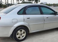 Daewoo Lacetti MT 2005 - Cần bán gấp Daewoo Lacetti MT năm 2005, màu bạc xe gia đình giá 125 triệu tại Hà Nội