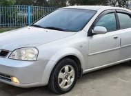 Daewoo Lacetti Max 2005 - Bán xe Daewoo Lacetti Max sản xuất năm 2005, màu bạc số sàn giá 125 triệu tại Hà Nội