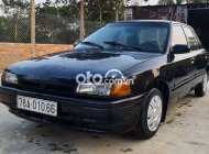 Mazda 323 MT 1994 - Cần bán xe Mazda 323 MT năm sản xuất 1994, màu đen, xe nhập, giá chỉ 39 triệu giá 39 triệu tại Đắk Lắk