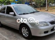 Mazda 323  MT 2002 - Cần bán xe Mazda 323 MT sản xuất 2002, màu bạc, nhập khẩu nguyên chiếc chính chủ giá 125 triệu tại Đồng Nai