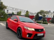 Kia Forte Koup SLi 2009 - Cần bán Kia Forte Koup SLi năm 2009, màu đỏ, giá tốt giá 310 triệu tại Hà Nội